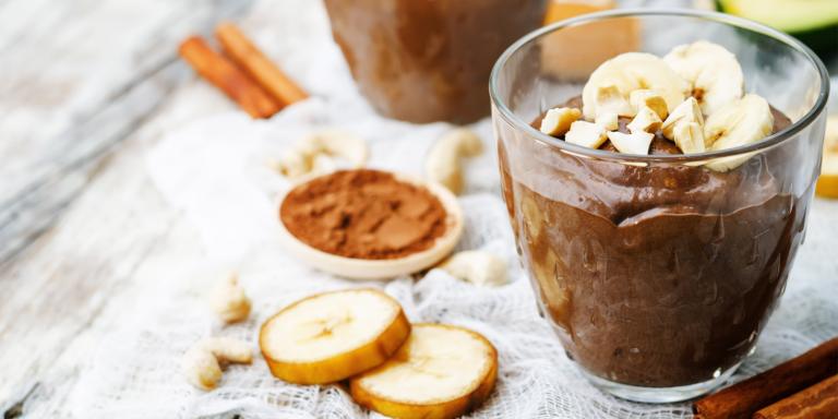 Chocolate and Banana Pudding in a glass dessert cup.