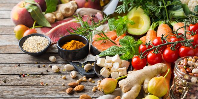 Assortment of healthy food ingredients for a Flexitarian diet on a wooden kitchen table